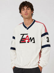 Men's oversized TEAM beige pullover front view V-neck close up