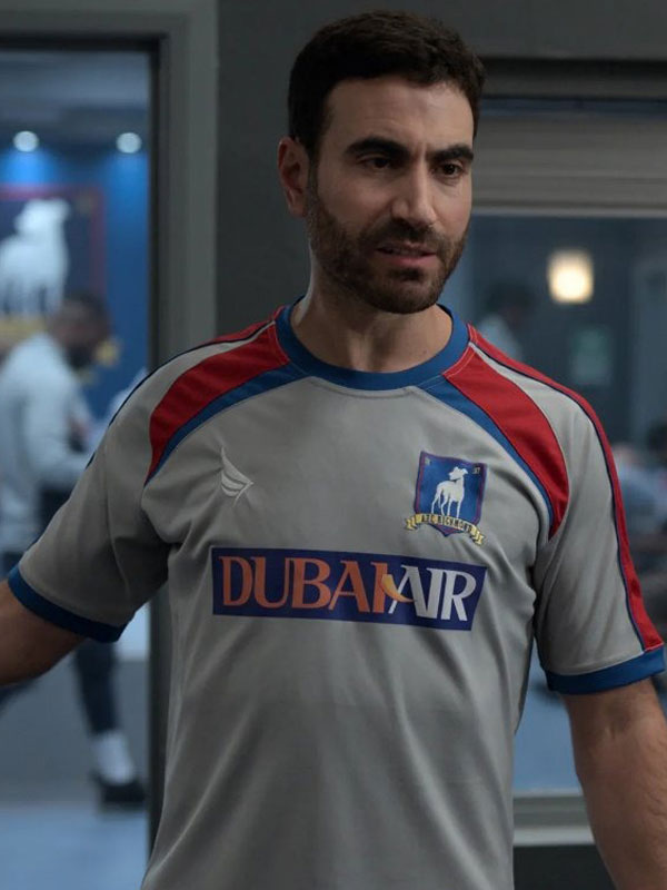 Brett Goldstein Roy Kent gray AFC Richmond jersey side profile locker room