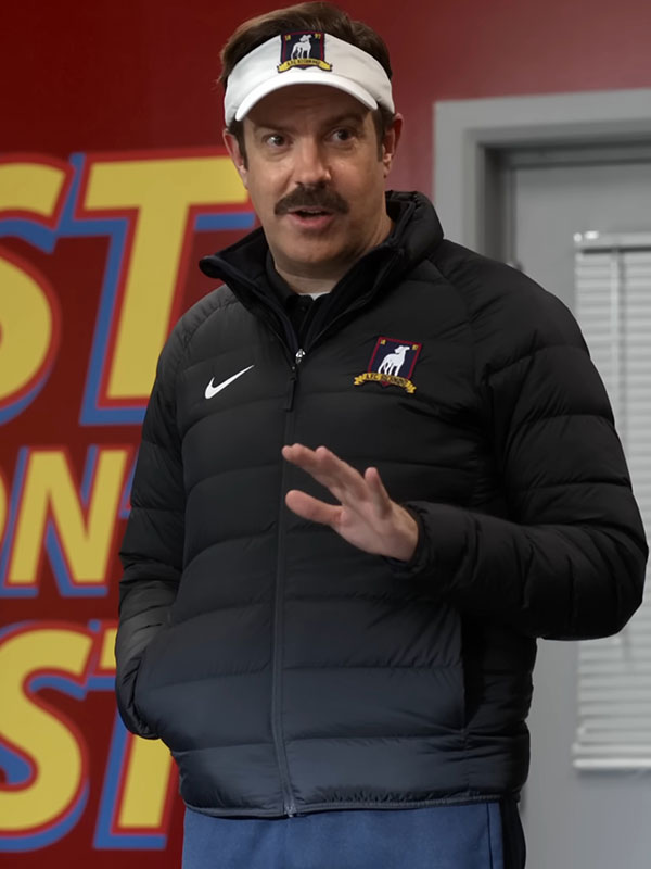 Ted Lasso Jason Sudeikis black puffer jacket front view locker room