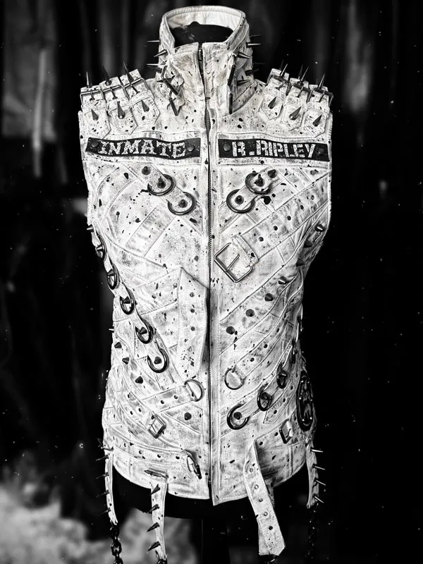 Brutality Asylum Studded white punk vest front view showing spike shoulder detailing, dark backdrop